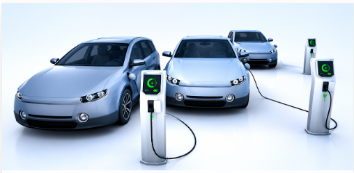 Three electric vehicles at charging stations — Shuga Fleet